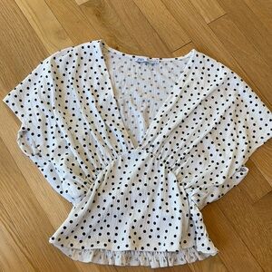 White blouse with black polka dots